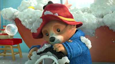 [joyful music] - The Adventures of Paddington
