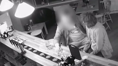 Julia was seen chatting
and drinking with a man. - Killers: Caught on Camera