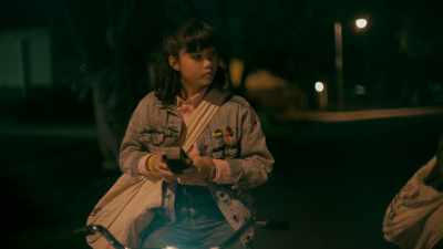 Just press the big button
on the side to talk - Paper Girls