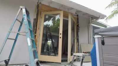 Justin and his dad replaced
the light in this bathroom, - Help! I Wrecked My House