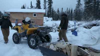 KALEB: Yeah, this is a whole
tree. The sled'’s not even full. - Life Below Zero: Next Generation