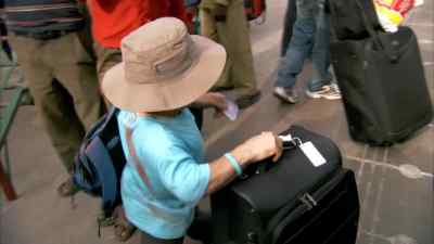 KARL: There's a kid being passed
through the window here. - An Idiot Abroad