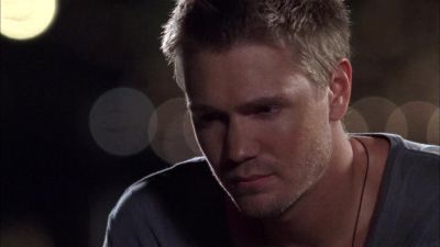Keith was holding jimmy edwards in the hallway. - One Tree Hill