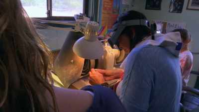 Kelly will rub and polish
the opals using diamond wheels - Outback Opal Hunters