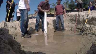 Kevin then places an auger
into the pipe - The Curse of Civil War Gold