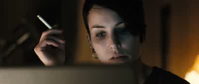 Killen i blå tröja. - The Girl with the Dragon Tattoo