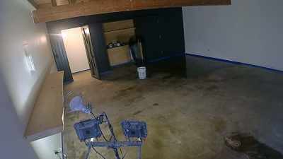 [Kim] In the party barn
we're putting down epoxy - Why the Heck Did I Buy This House?