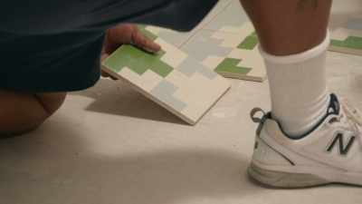[Kim] This tile is a huge
upgrade from
the vinyl flooring - Why the Heck Did I Buy This House?