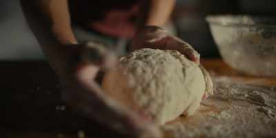 Kneading the dough,
waiting for it to ferment and rise, - Chef's Table: Pizza