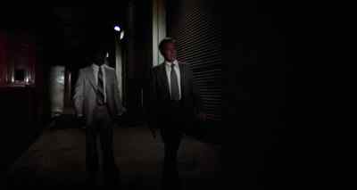 L saw him go in this building.
This door, here. - Black Gunn