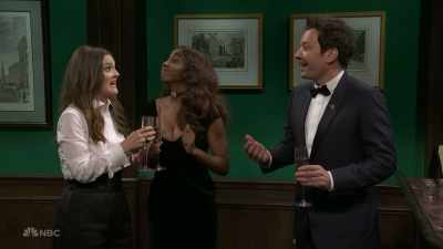 ‫[ Laughter ]
‫What you in here for, chief?
‫Let me guess, manipulating - SNL50: The Anniversary Special