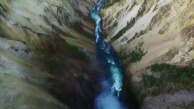 Leaving behind a ravine
4,000 feet across, - Yellowstone: One-Fifty