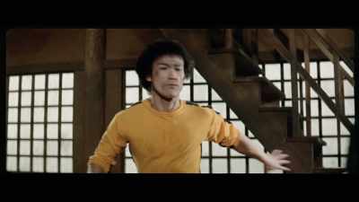 'Lee fails to stop Chieh
from ascending the stairway, - The Final Game of Death