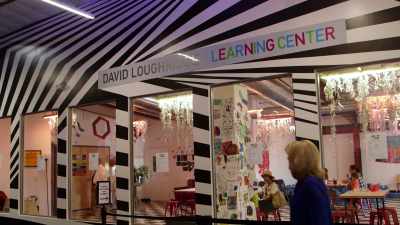- [Leslie] Just to walk
in to see his name is, - Meow Wolf: Origin Story