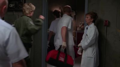 Let's get him scrubbed down. - Stargate SG-1