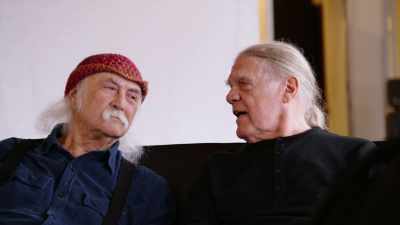 Let's make a flag gun,
and let's get a white backdrop, - David Crosby: Remember My Name