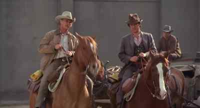 Let's ride in the rear.\nl don't like havin' my back to 'em. - The Magnificent Seven Ride!