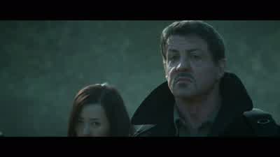 Lie down with your face on the ground until we leave. - The Expendables 2