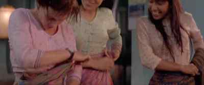 Like so. Burmese dress
becomes you very much. - Beyond Rangoon