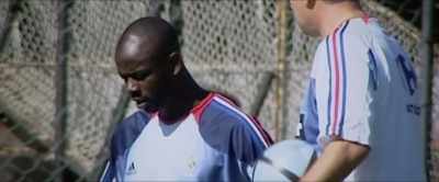 Lilian Thuram is listening
to Jacques Santini - Rooney