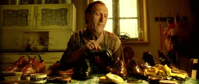 Lining up all his shoes and polishing them. Emptying his tool box, cleaning it out, and putting everything back. Amélie's mother, Amandine,a schoolmistress from Gueugnon, has always had shaky nerves. FACIAL TWITCH = WEAK NERVES Amandine Poulain - Amélie