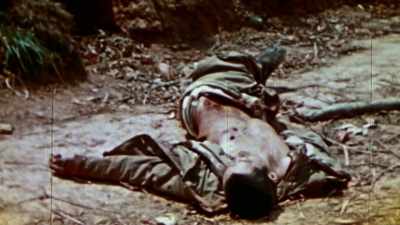 Litter the peaks,
trenches, and tunnels. - The Pacific War in Color