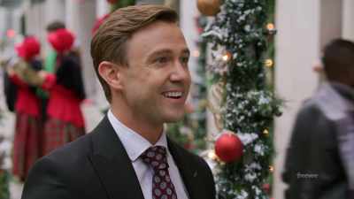 Little dog, black and tan
with happy waggin' tail? - Hotel for the Holidays