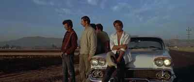 Look at your glasses, man. - American Graffiti