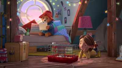 Look at him sleeping.
Probably dreaming about his adventures. - The Adventures of Paddington