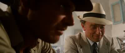 Look at thisIt's worthlessTen dollars from a vendor in the streetBut I take itI bury it in the sand for a thousand yearsit becomes priceless Like the Ark - Indiana Jones and the Raiders of the Lost Ark