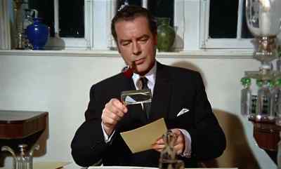 LOTUS: Please, sir,
a telegram for you, sir. - The Blood of Fu Manchu