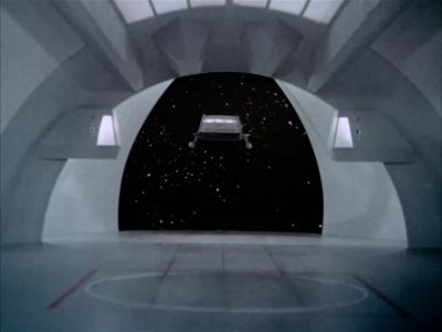 [Loudspeaker]
Hangar doors open and clearing - Star Trek