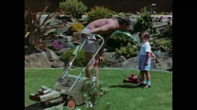 -["Lucky Country" playing]
-[lawn mower whirring] - Midnight Oil: The Hardest Line