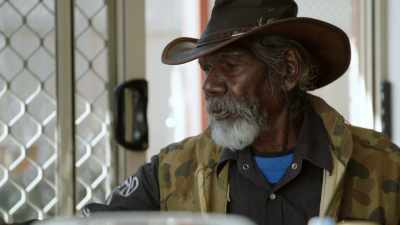 Lying down next to
the blue tongue lizard. - My Name Is Gulpilil