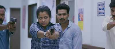 Ma'am, he's holding a very sensitive gun.
It'll get fired easily - Ratsasan