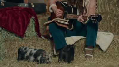 [Maggie strumming her guitar] - All I Need for Christmas
