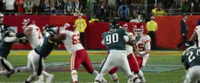 Mahomes, in trouble, gets away. - Kelce