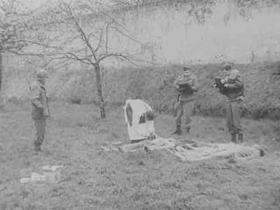 Major Bolker performs the autopsy. - Nazi Concentration Camps