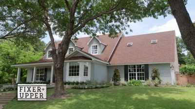 making-sure-everything-looks-good-all-the-candles-are-lit - Fixer Upper: Behind the Design