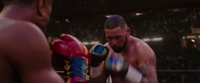 [Male commentator]
Conlan stalking his prey, - Creed III