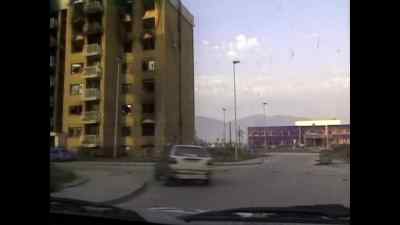 [man 2 on TV] Snipers hidden
in these buildings, - Never Look Away
