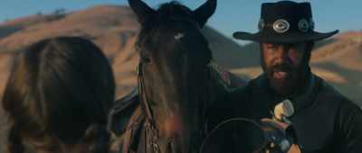 [man 6 speaking
in Indian dialect] - Outlaw Johnny Black