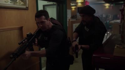     [man continues shouting
      in foreign language] - Chicago P.D.
