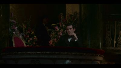 [man continues singing] ♪ Wahrheit wagt ♪ - The Crown