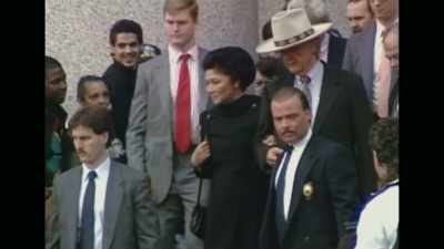 [man] Imelda Marcos
is wearing black - The Kingmaker