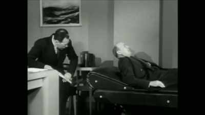 MAN (in film):
He is placed on a couch - Mysteries of Mental Illness