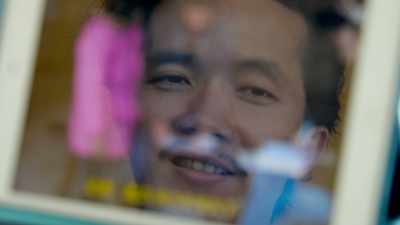 MAN [IN MANDARIN]: - One Child Nation