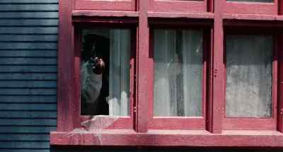 Man in the window. - Expect No Mercy