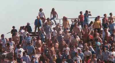 [man on loudspeaker]
'Here's the carnival thrill..' - The Dukes of Hazzard