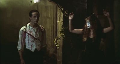 Man on megaphone Put your hands up - Santa Sangre